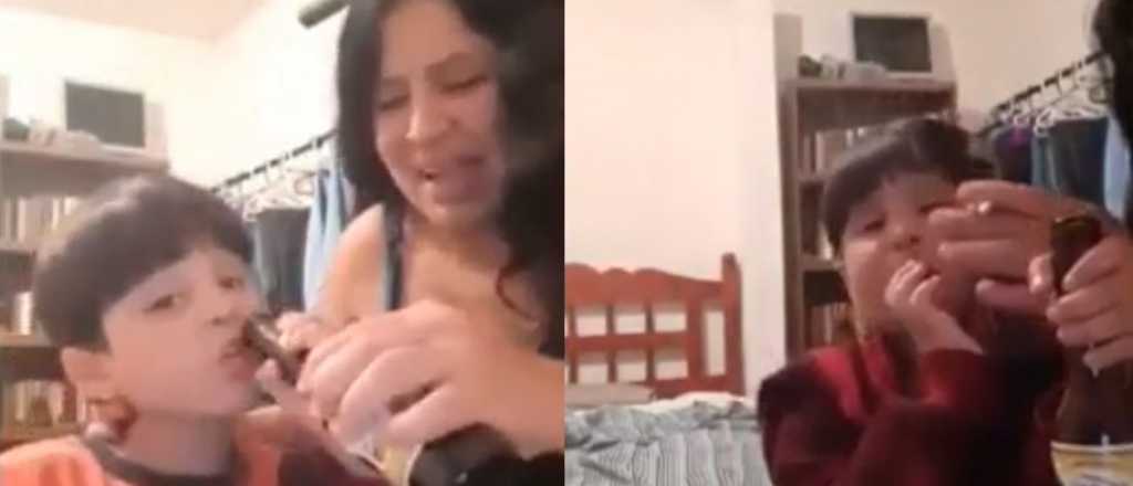 Video: una mujer obliga a su hijo a tomar cerveza y a fumar