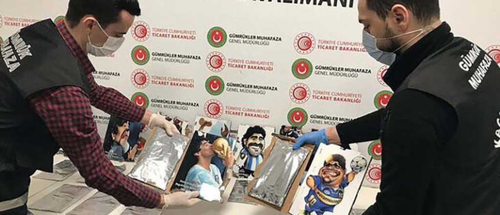 Escondía casi 3 kilos de cocaína en retratos de Maradona