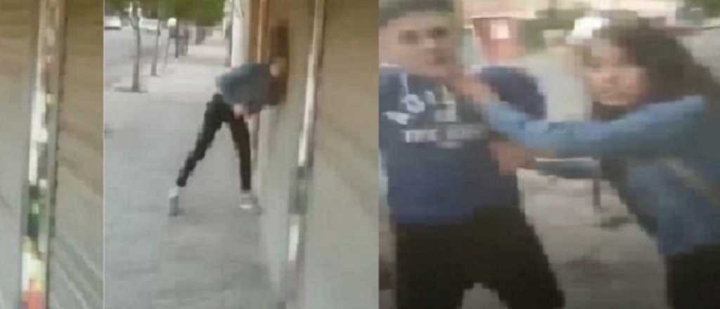 Una joven golpeó a su novio en la calle y le dio un cabezazo a un portón