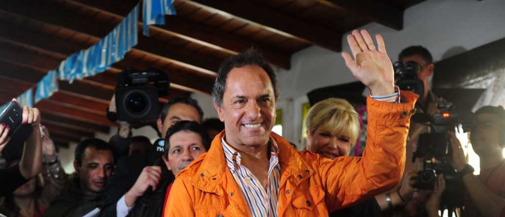 Votó Scioli y recordó su slogan: "Tengo más fe y esperanza que nunca"